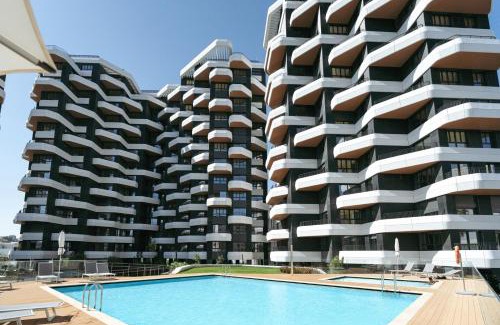 Parque das Nacoes Apartment | Premium Flat w/Balcony & Pool by HostWise