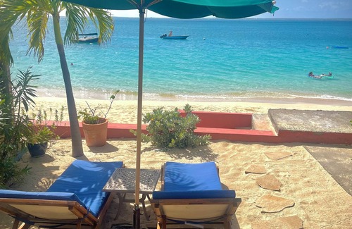 Grand Case Apartment | Pretty Beach side appartment with a private garden. Unique setting, Unique spot