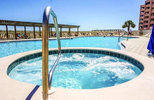 Holiday Isle Condo | PRIVATE BEACH, Heated Pool, Hot Tub, Live bands in summer. Honeymooon favorite