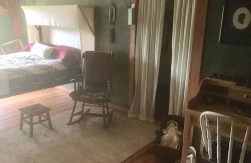 Pembine House | Private Colonial-themed room with shared bath and kitchenette