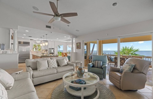 Marathon House | Private, Gated, Oceanfront, Beachfront 5-Star Estate with dock, putting green.