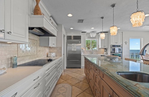 Marathon House | Private, Gated, Oceanfront, Beachfront 5-Star Estate with dock, putting green.
