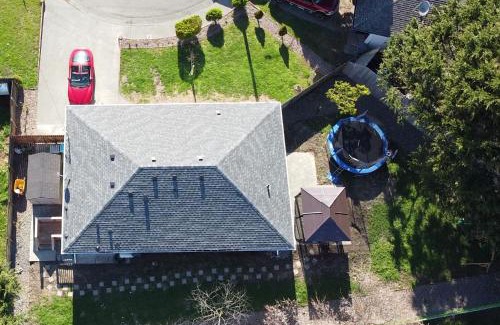 Crescent City House | Private Home - Playground, Jumping Mat, BBQ, Darts, Firepit, Gazebo, 4 Smart TVs, White Cotton Bedding, - The Redwood Cul-De Sac Beach Retreat
