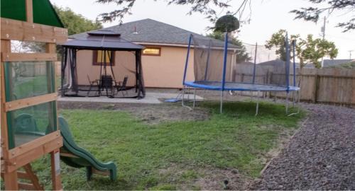 Crescent City House | Private Home - Playground, Jumping Mat, BBQ, Darts, Firepit, Gazebo, 4 Smart TVs, White Cotton Bedding, - The Redwood Cul-De Sac Beach Retreat