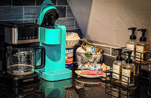 Sunrise Beach House | Private lakefront A-frame nestled in the forest on a quiet cove at Lake of the Ozarks. Sleeps 12 with 4 bedrooms, 2 baths, private dock, kayaks, coffee bar, and decks overlooking the water. Peaceful, scenic, and perfect for families or friends.