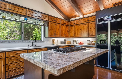 Oakhurst House | PRIVATE RESORT STYLE RIVERFRONT ESTATE W/TENNIS COURT, POOL, SPA, WATERFALLS.