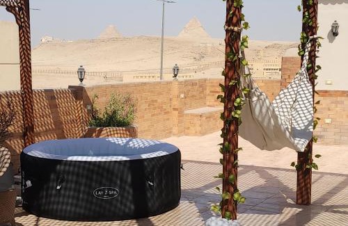 Pyramids Gardens Apartment | Private rooftop with jacuzzi and pyramids view