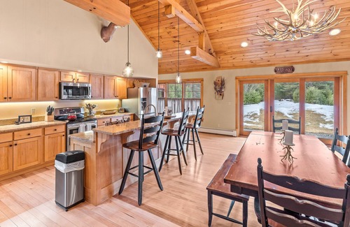 Olmstedville House | Private, secluded mountain home with a wood fireplace & screened deck