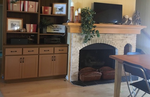 Gaylord House | Private wooded lake front log cabin perfect for large groups