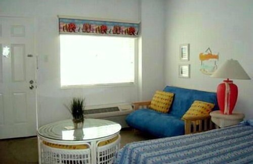 North End Condo | Professionally decorated with in ground pool. 1 1/2 blocks to the beach, boardwalk and shopping. Assigned off street parking!
