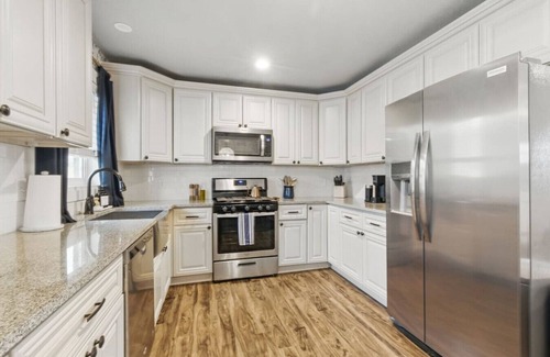 Arvada Plaza Area House | Projector Nights & Park Delights I Designer Reno