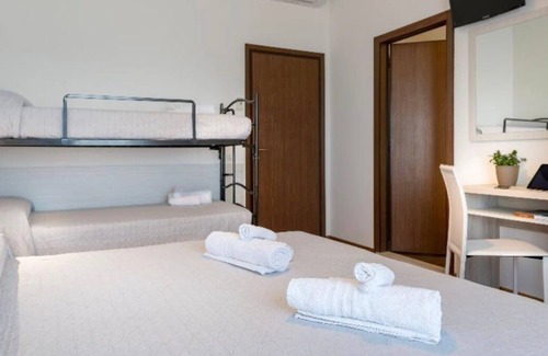 Cagnona Hotel | Quadruple Room, Rich Breakfast Included