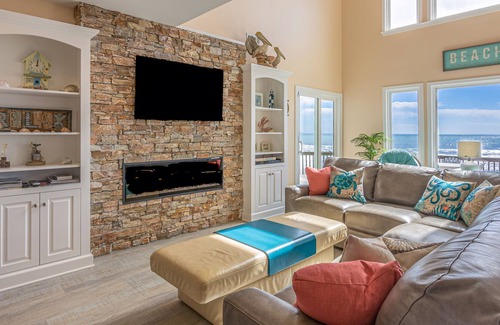 Village of Stump Sound House | Quaint beachfront cottage with Ping-Pong table, decks, community pool & views
