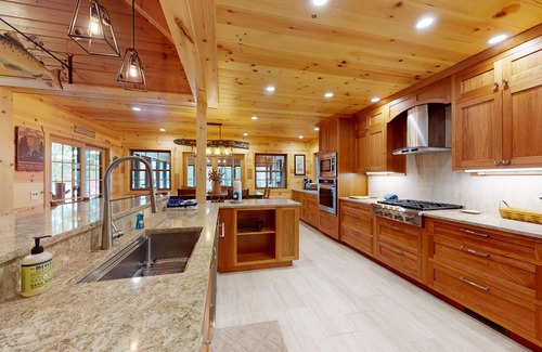 Minocqua House | Quaint lakefront cabin w/indoor & outdoor fireplace, private dock - dogs OK