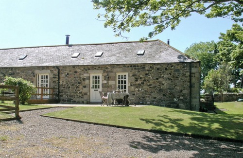 Bamburgh Cottage | Quality accommodation which boasts views across Budle Bay and Holy Island.