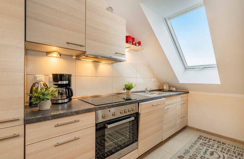 Zinnowitz Apartment | Quartier Görmitz 36 - 12 Eulennest: Feel-good oasis in Zinnowitz with sauna & fireplace