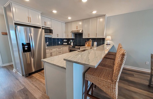 Topsail Beach Condo | Queen's Grant E-116 – Oceanfront Serenity Awaits