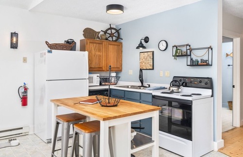 La Pointe Apartment | Queen Suite at Ferry Landing Suites in Downtown La Pointe!