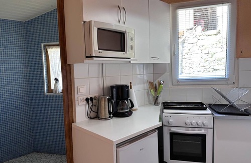 Laprugne Cottage | Quiet cottage with wood stove, terrace, and pets allowed