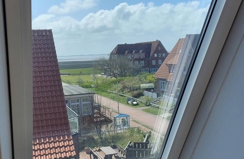Baltrum Apartment | Quiet maisonette island apartment with 2 bedrooms, sea view and balcony