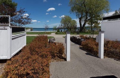 Suttons Bay Cottage | Quiet, Private, Waterfront - Luxury on 125 Ft. of Suttons Bay