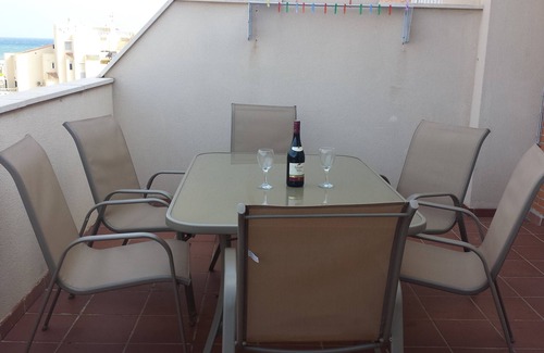 Roquetas de Mar Apartment | Quiet sunny apartment, 3 min walk to beach, communal pools, terrace, WIFI A/C TV