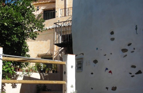 Orgiva House | Quiet village house, central and comfortable with garden and heated pool, garage