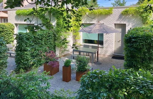 Ghent Condo | Quietly located luxury one-room flat on the ground floor with garden and free private parking
