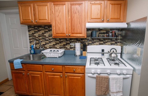 Garfield Heights House | Radiant Rockside Retreat, Fast internet, Self-check in, 3 bdrm, office, garage.