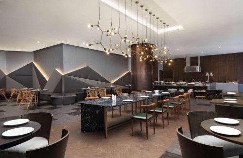Jingkou District Hotel | Ramada by Wyndham Zhenjiang Dagang New District