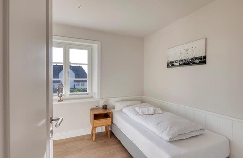 Rantum Apartment | Rantum Dorf - Ferienappartments im Reetdachhaus 3 & 4
