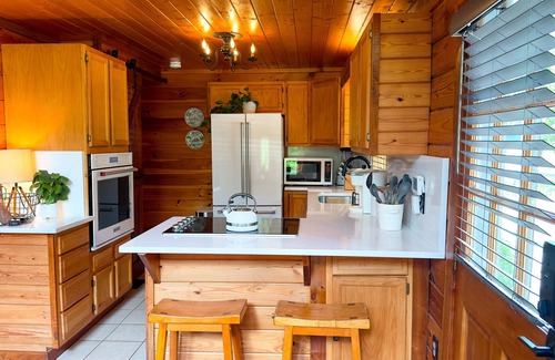 Sevierville Cabin | Rare & Private Riverfront Cabin with Natural Swimming Hole