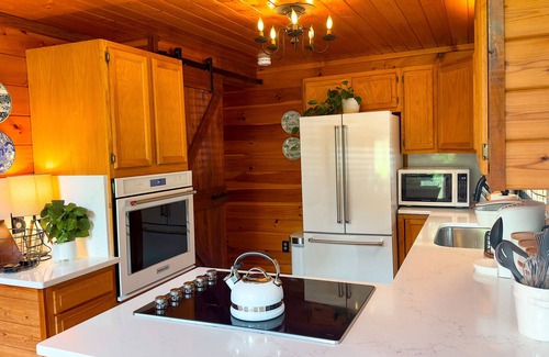 Sevierville Cabin | Rare & Private Riverfront Cabin with Natural Swimming Hole