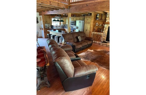 Bourbon Cabin | Real Log Cabin with Seasonal Pool and Hot Tub near Blue Springs Ranch