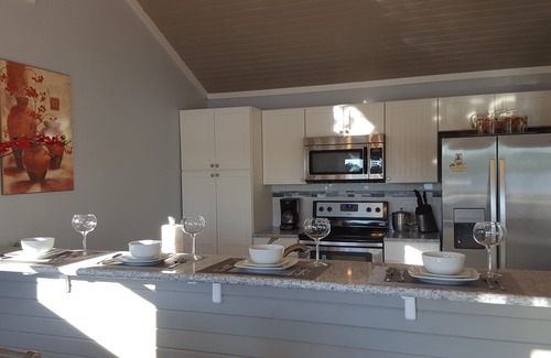 Lake Ozark House | Recent remodel! And your own covered boat dock with sectional sofa & fire table!