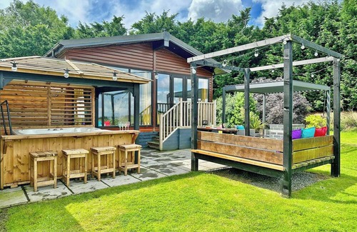 Raywell Ski Chalet | Recently upgraded with Gazebo over hot tub and side bar with stools.