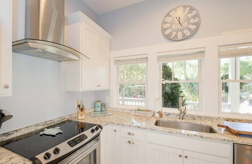 Cape Fear Station House | Reel Life tucked into a pretty, wooded bend in prestigious Cape Fear Station!
