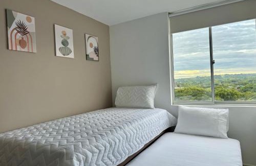 Armenia Apartment | Refugio Central con Parqueo Privado