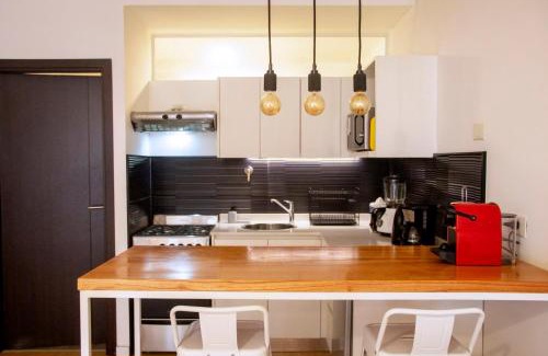 Comuna 12 Apartment | Refugio otoñal cozzy y super equipado con parrilla y terraza