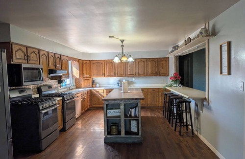 Thompsonville House | Relax at a cozy countryside retreat with a private hot tub, pond views & fire pit — pure bliss.