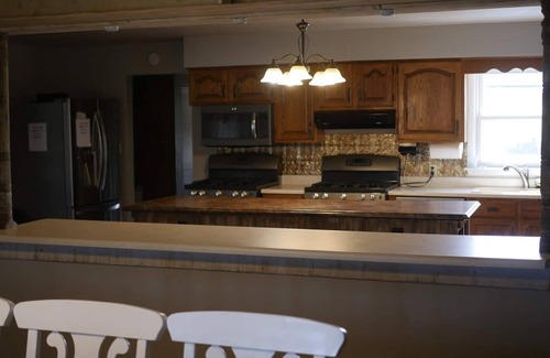 Thompsonville House | Relax at a cozy countryside retreat with a private hot tub, pond views & fire pit — pure bliss.