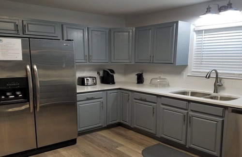 Foley House | Relax by the private pool! Five bedrooms await you near Gulf Shores Beach