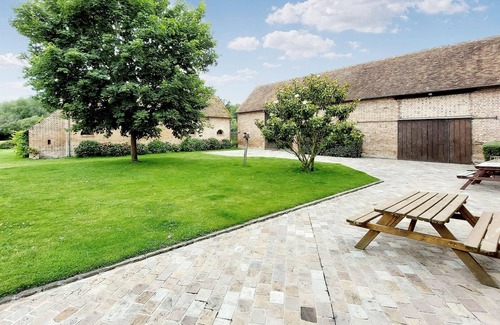 La Ferte-Saint-Aubin House | Relax in this historic and characterful holiday home with shared pool.