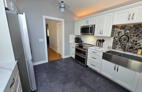Frankfort House | Relax in your home; yards from the Frankfort Beach and the downtown attractions.