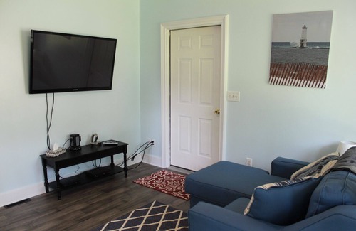 Frankfort House | Relax in your home; yards from the Frankfort Beach and the downtown attractions.