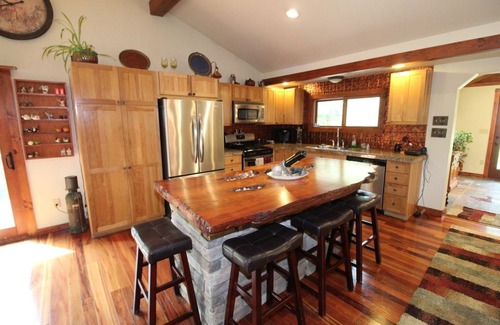 Grayling House | Relax, Unwind and Enjoy. Rustic log cabin with private Au Sable River Frontage!