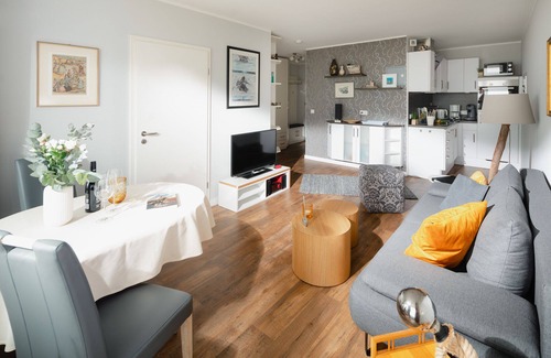 Norderney Apartment | "Relax with a sea view: Above the rooftops of Norderney"