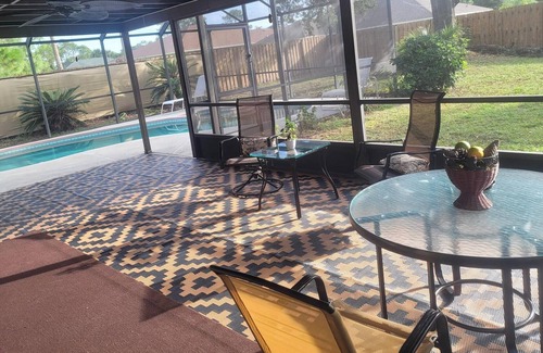 Palm Bay House | Relax with your family and friends at this spacious and private pool home.