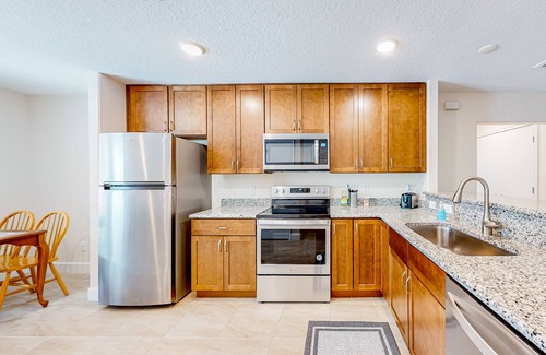 Port Malabar House | Relaxing home with patio, W/D, full kitchen, & Pack-N-Play - golf nearby