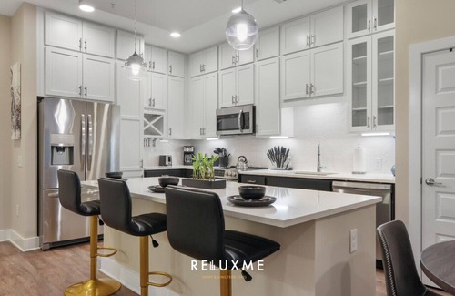 Fourth Ward Apartment | Reluxme| Lux 2BR Uptown| Spa Access + Skyline View